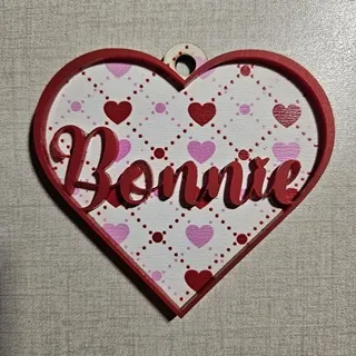 Heart ornament made with next level sheet and red acrylic